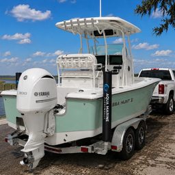 Padded trailer guide pole covers on a boat trailer