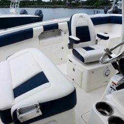 Marine upholstery restoration with diamond-stitched boat seating